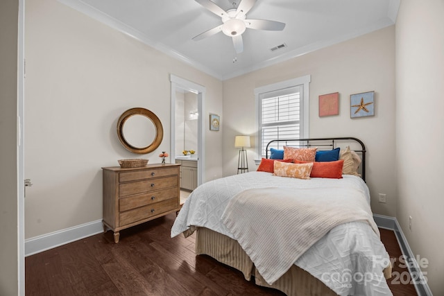 bedroom featuring dark wood-type flooring, ceiling fan, ornamental molding, and ensuite bathroom