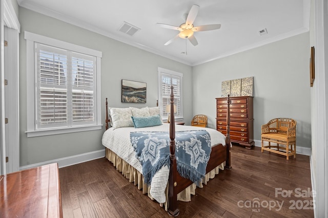 bedroom featuring ornamental molding, ceiling fan, and dark hardwood / wood-style flooring