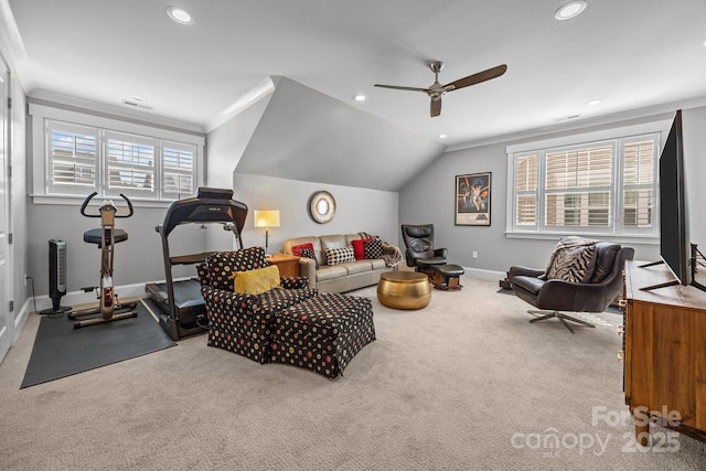 carpeted living room featuring ceiling fan, lofted ceiling, and a wealth of natural light