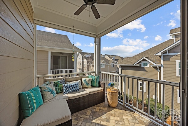 balcony featuring an outdoor hangout area and ceiling fan