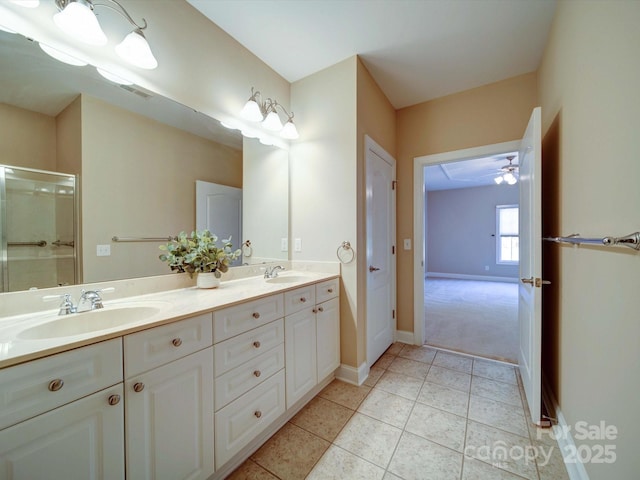 bathroom with vanity and tile patterned flooring