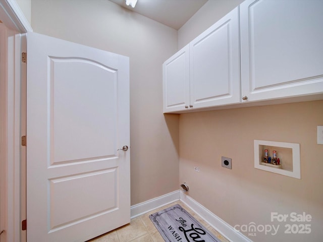 laundry room with electric dryer hookup, cabinet space, light tile patterned floors, baseboards, and hookup for a washing machine