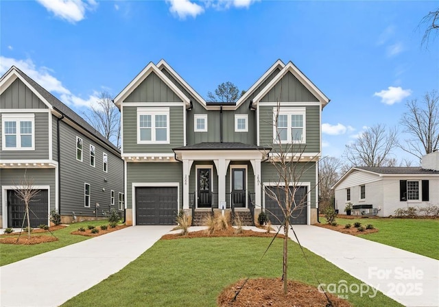 craftsman-style house with a garage and a front yard