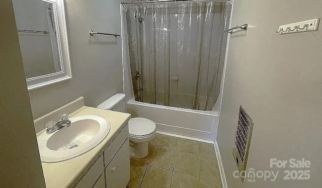 full bathroom featuring shower / tub combo with curtain, vanity, toilet, and tile patterned flooring