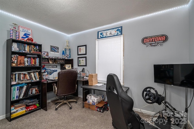 office area featuring carpet flooring and a textured ceiling