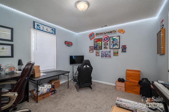 office space featuring carpet flooring and a textured ceiling