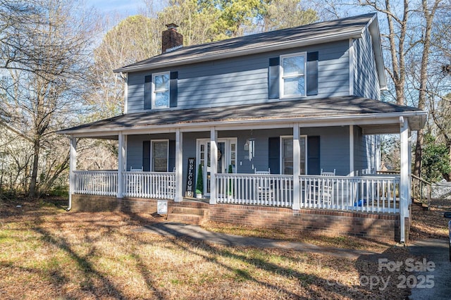 farmhouse-style home with covered porch