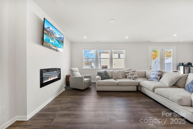 living room featuring dark hardwood / wood-style floors