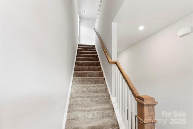 stairway with carpet flooring