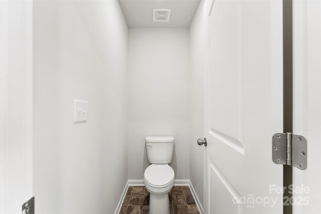 bathroom featuring toilet