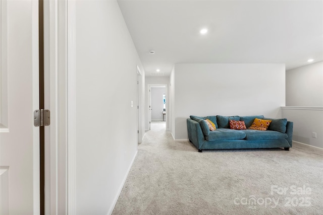 living room featuring light carpet