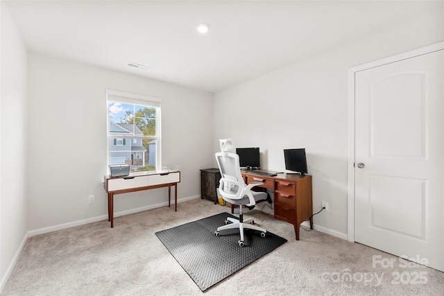 view of carpeted office space