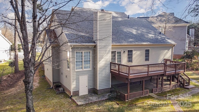 rear view of property with a deck