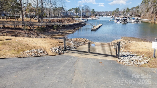 view of dock with a water view