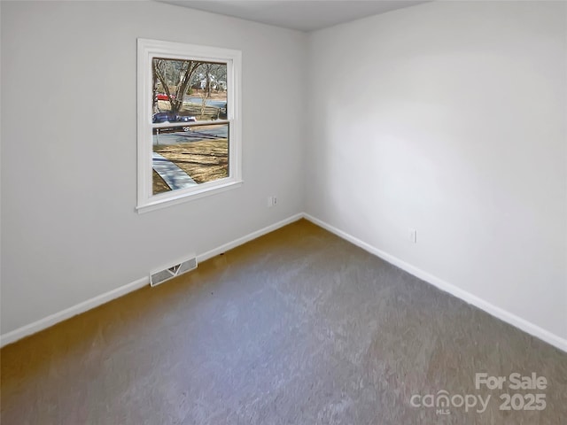 view of carpeted spare room