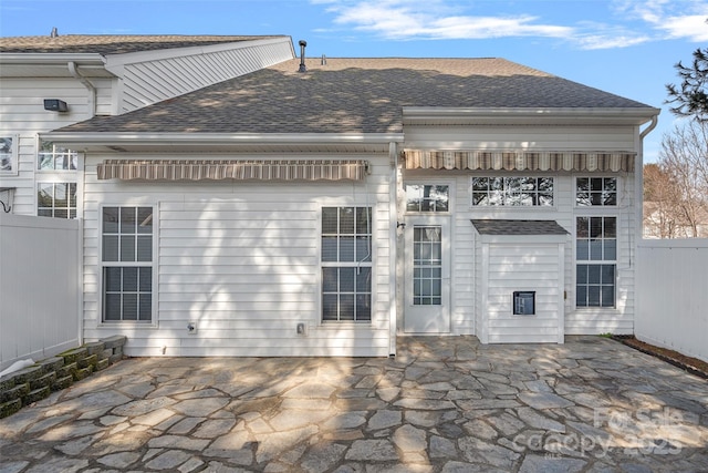 rear view of property featuring a patio