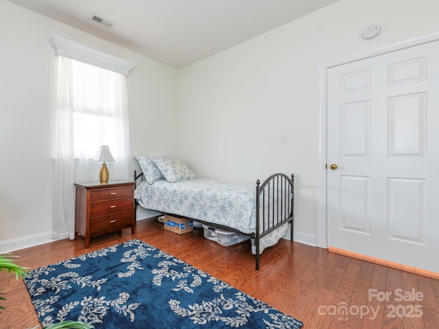 bedroom featuring hardwood / wood-style flooring