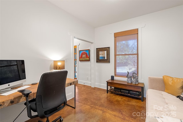 home office with concrete floors