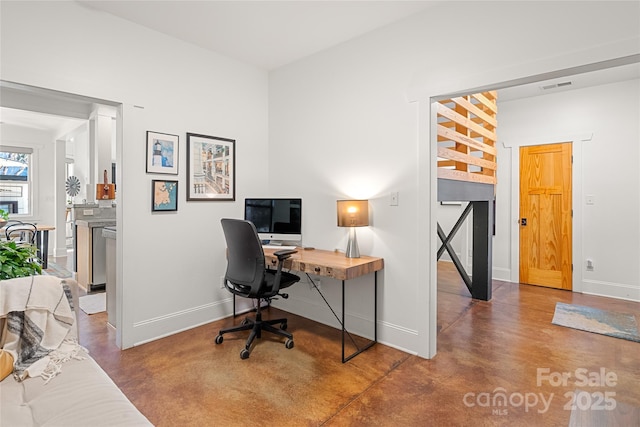 office featuring concrete flooring