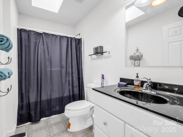 full bathroom featuring vanity, toilet, shower / tub combo, and a skylight