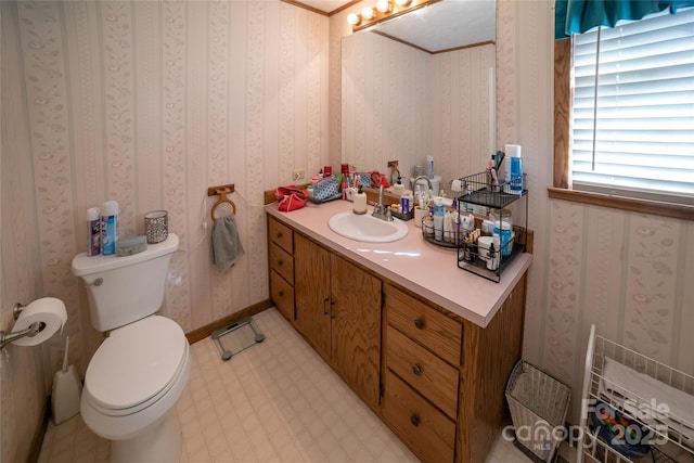 bathroom with vanity and toilet