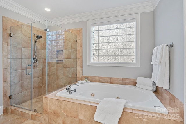 full bathroom featuring a tub with jets, a shower stall, and crown molding