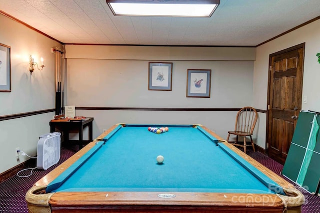 game room with billiards, ornamental molding, and carpet