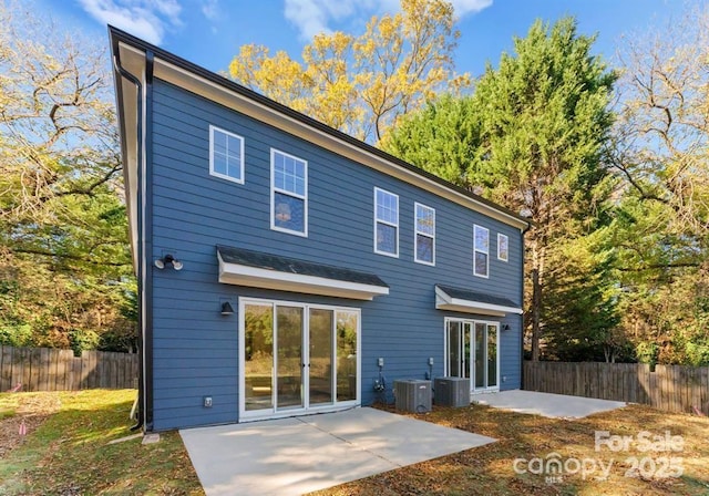 back of house featuring central AC and a patio