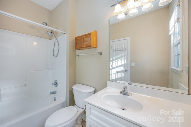 full bathroom with vanity,  shower combination, and toilet