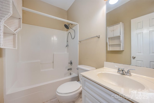 full bathroom featuring vanity, toilet, and bathtub / shower combination