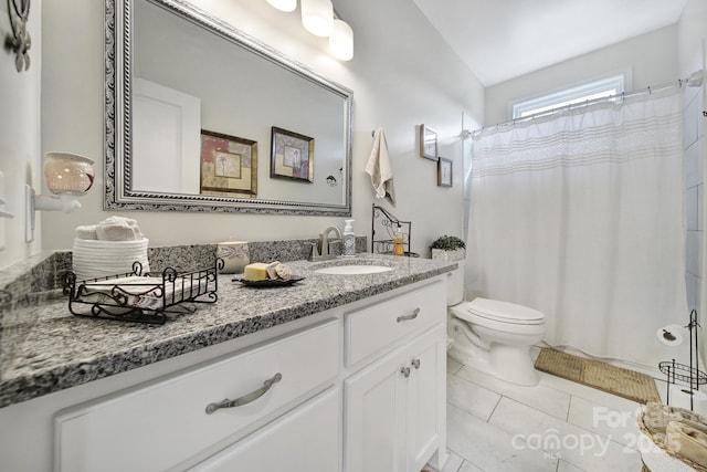 bathroom featuring a shower with curtain, vanity, tile patterned floors, and toilet