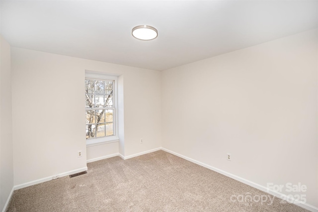 view of carpeted spare room