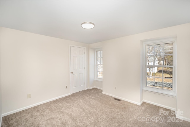 view of carpeted spare room