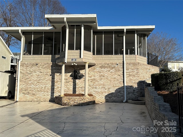 exterior space with a sunroom