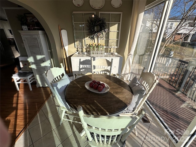 dining room with wood-type flooring