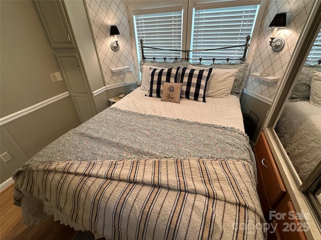 bedroom with wood-type flooring