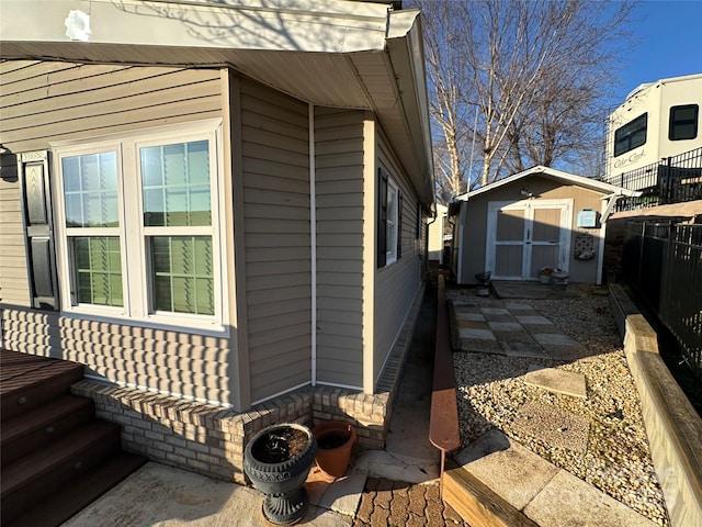 view of property exterior with a shed