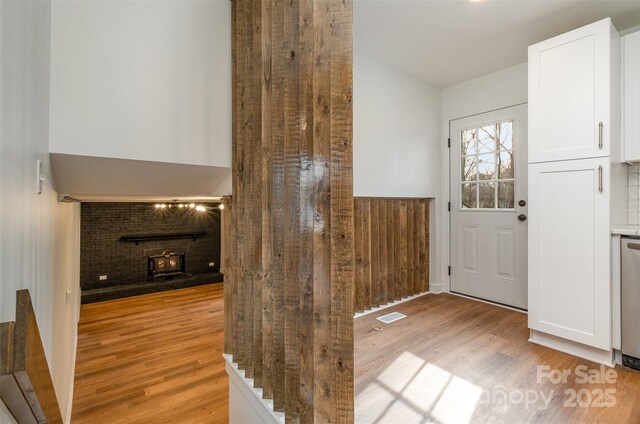 entrance foyer with light hardwood / wood-style flooring