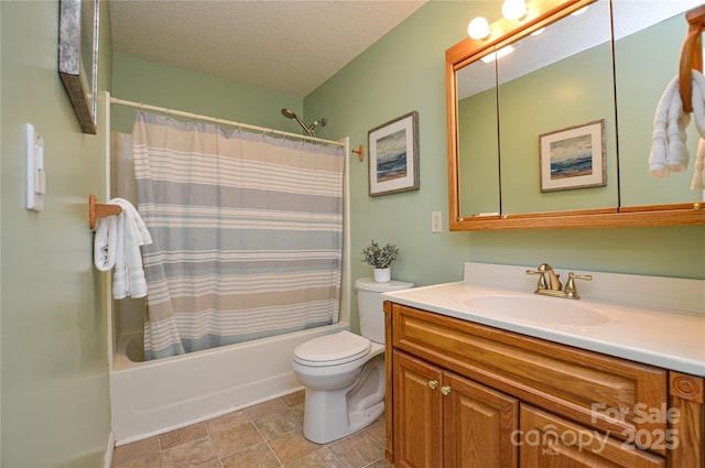 full bathroom with vanity, shower / tub combo, a textured ceiling, and toilet