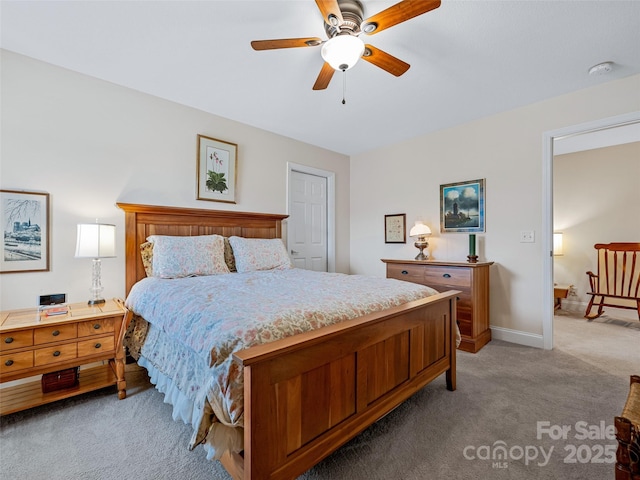 carpeted bedroom with ceiling fan