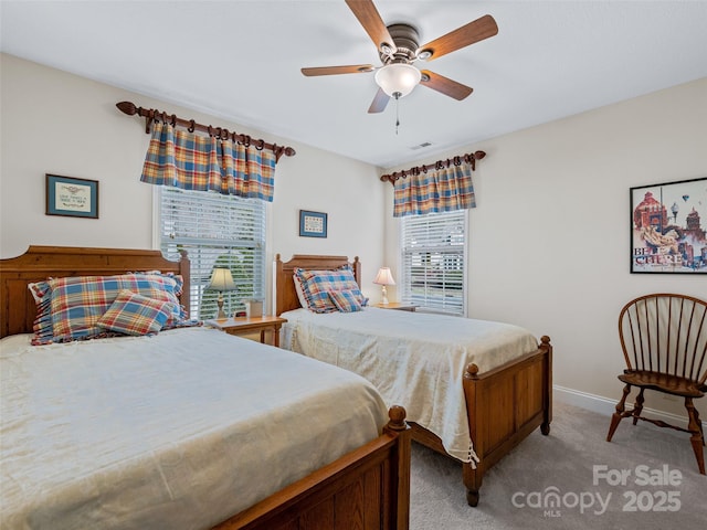 bedroom with light carpet and ceiling fan