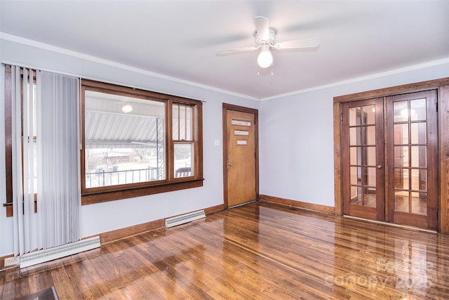 interior space with crown molding, wood-type flooring, french doors, and ceiling fan