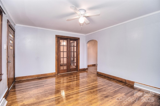 unfurnished room featuring crown molding, hardwood / wood-style flooring, and ceiling fan