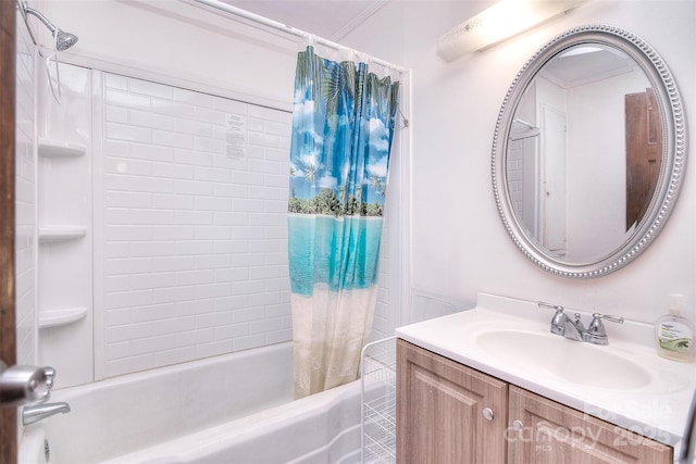 bathroom featuring ornamental molding, vanity, and shower / bath combo