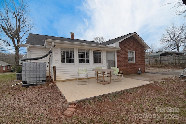 rear view of property with a patio area