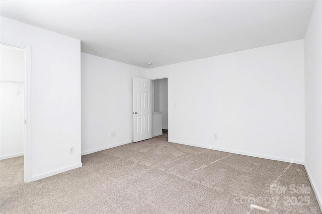 unfurnished room with carpet flooring