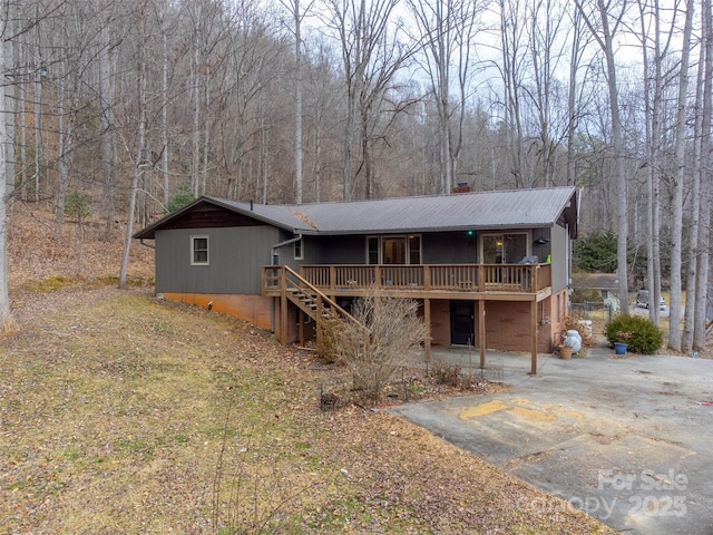 view of front facade with a deck