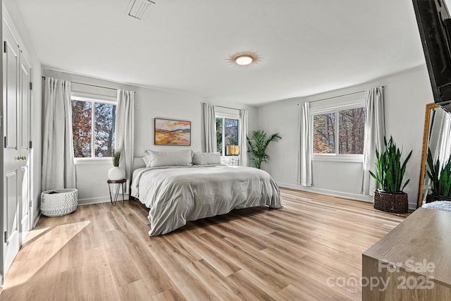 bedroom featuring light hardwood / wood-style flooring