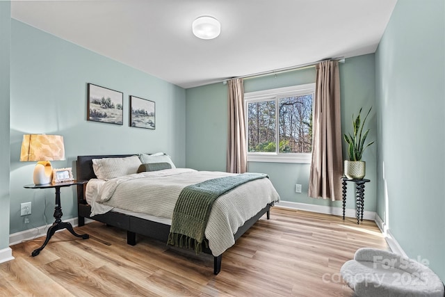 bedroom featuring light hardwood / wood-style floors