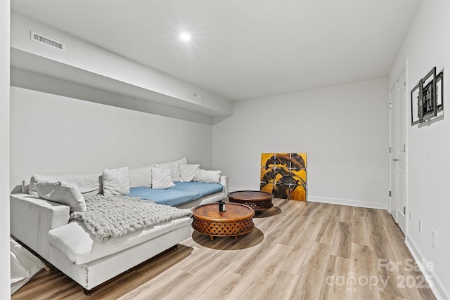 living area with wood-type flooring